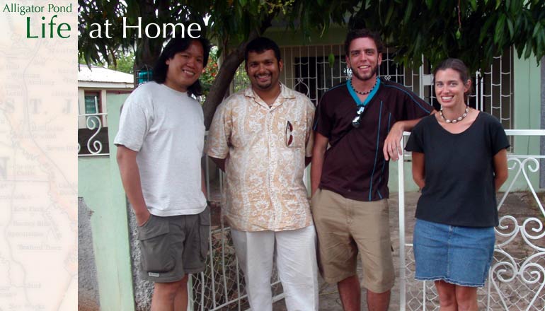 Alligator Pond: life at home....  Gerry, Tanuj, Preston and Amy gather in front of Amy and Tanuj's place after a seafood meal at the renowned Little Ochi restaurant